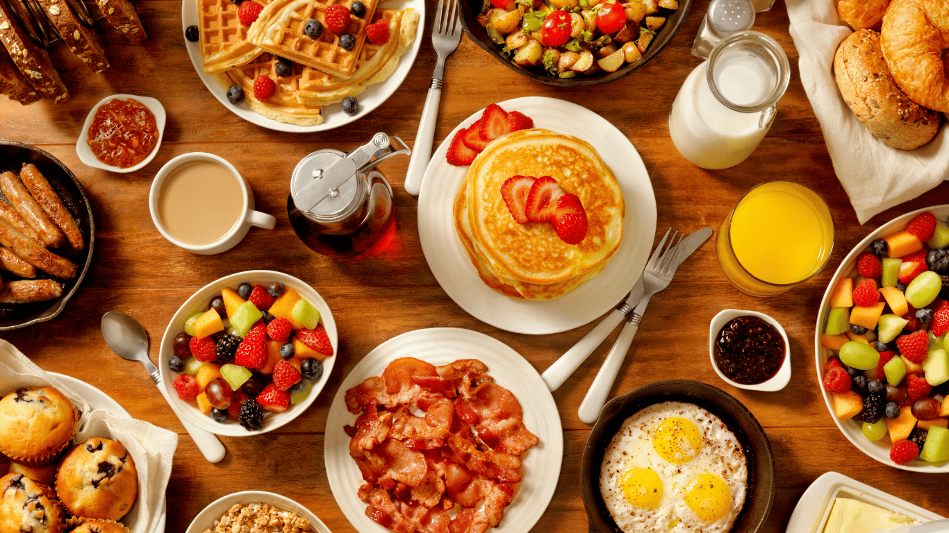 A table with multiple breakfast items.